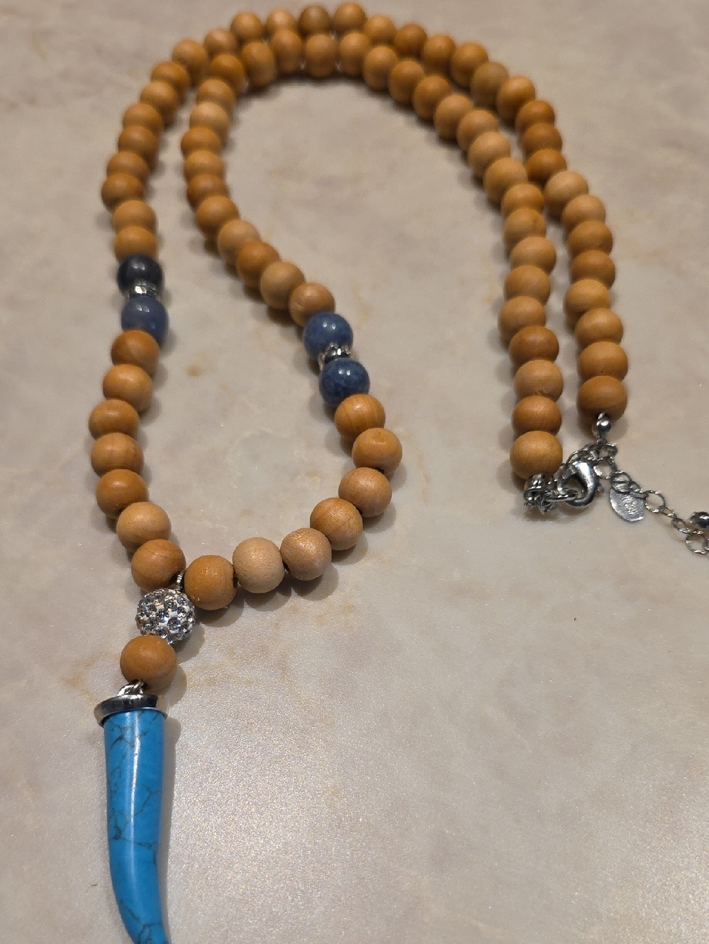 Natural Wood Beaded Necklace with Turquoise Horn Pendant